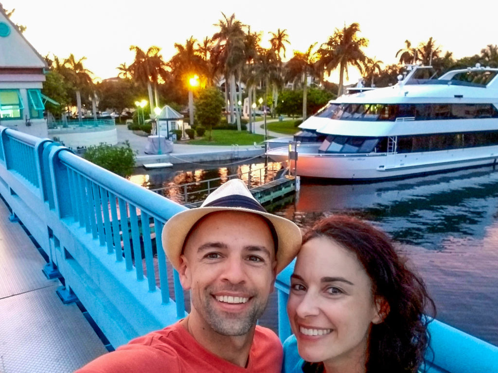 Watching the sunset from the bridge with a yacht in Delray Beach